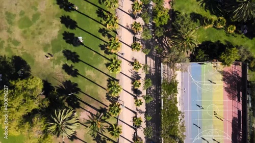 Overhead view over Ines de Suarez Park with people walking and trees in the background photo