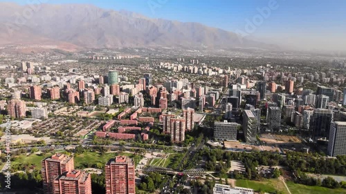 Aerial view over Santiago de Chile main residential part of the city Las Condes on a sunny day photo