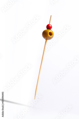 Isolated olives on skewers with white background
