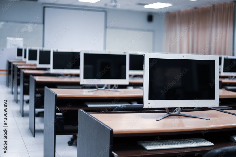 The computer lab is empty at the university. The computer lab is empty at the university.