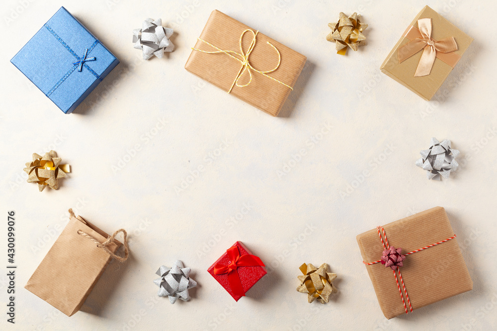 Gift Wrapping. A bright background with packaging accessories and gifts. Creative composition. Place for description. Top view. Gift Wrapping. A bright background with packaging accessories and gifts. Creative composition. Place for description. Top view.