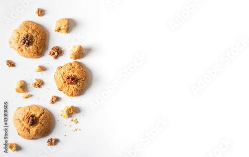 homemade cookies chocolate chips with nuts on a white background, top view