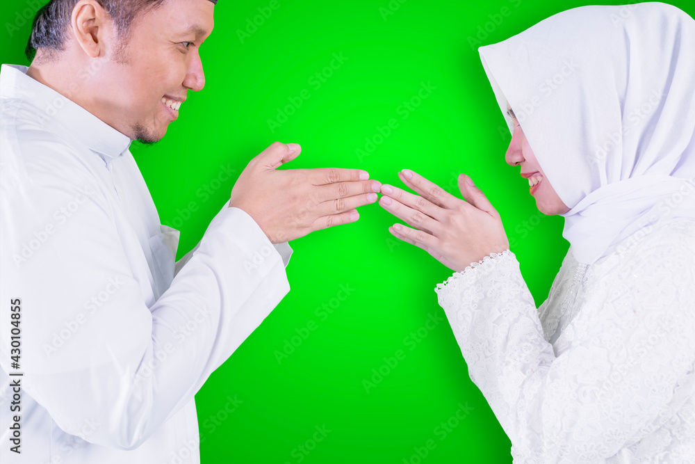 Woman shows congratulate hands Eid to husband Woman shows congratulate hands Eid to husband