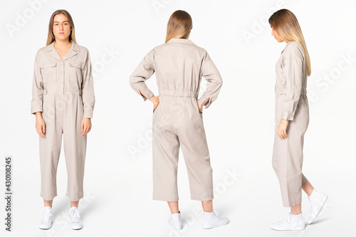 Fényképezés Blonde woman in beige jumpsuit with design space streetwear apparel full body se