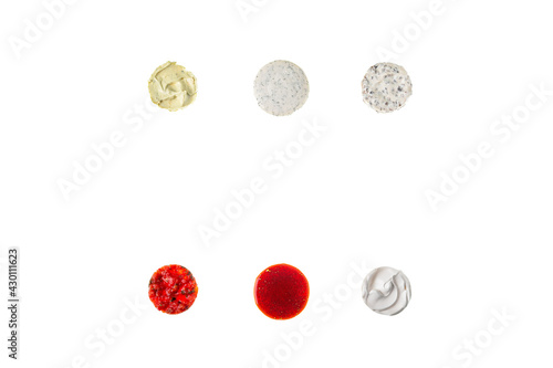 Different sauces on a white background