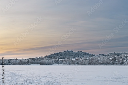 Winter view of Frösön Island and the frozen Storsjön Lake in Östersund