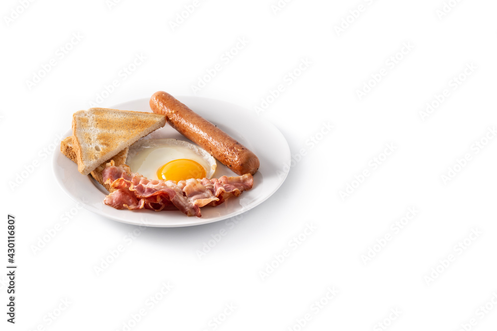 Traditional American breakfast with fried egg,toast,bacon and sausage isolated on white background