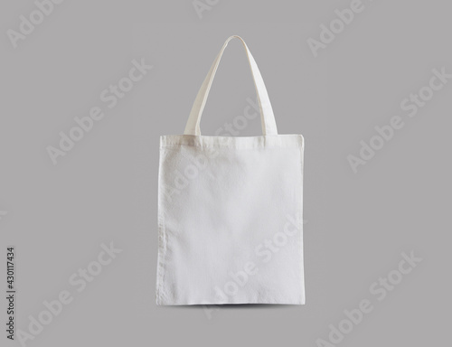 Mockup tote eco bag canvas for shopping. Isolated over grey background