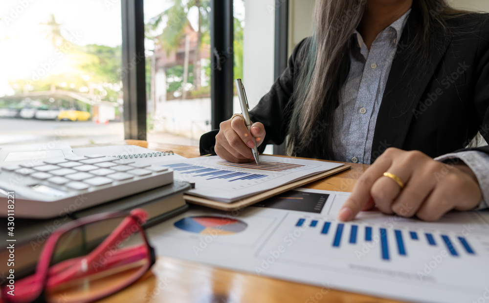 accountant or banker calculating or checking balance. Bookkeeper or financial inspector making financial report. Home finances, investment, economy, saving money or insurance concept accountant or banker calculating or checking balance. Bookkeeper or financial inspector making financial report. Home finances, investment, economy, saving money or insurance concept