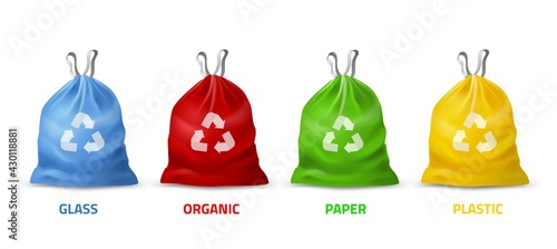 Trash bags colors. Realistic packages with handles for separate garbage collection, different colors and recycling sign, biodegradable plastic, eco care. Vector 3d isolated set