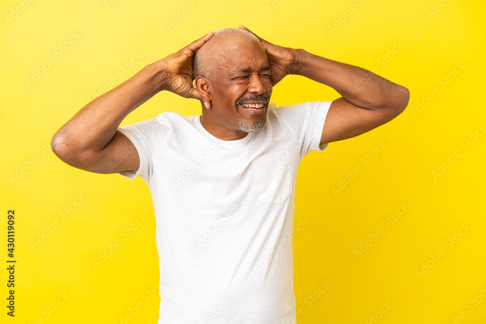 Cuban Senior isolated on yellow background stressed overwhelmed Cuban Senior isolated on yellow background stressed overwhelmed