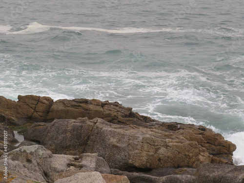 waves crashing on rocks