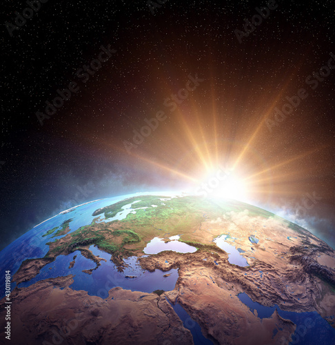 Fototapeta Naklejka Na Ścianę i Meble -  Surface of Planet Earth from space. Sunrise, explosion, impact on the horizon. 3D illustration - Elements of this image furnished by NASA