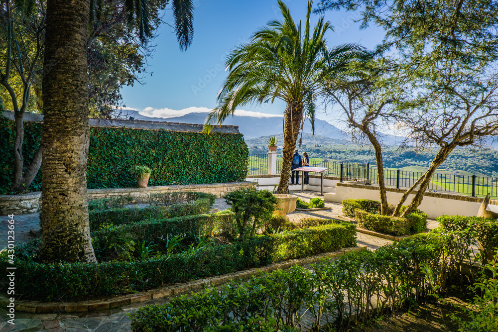 Fototapeta premium The cute garden located on the terrace of Ronda in the Mondragon palace in Andalusia, Spain