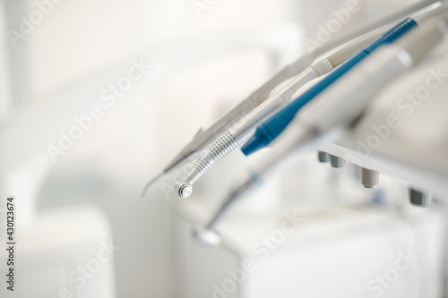Closeup of a modern dentist tools  burnishers with blurred background