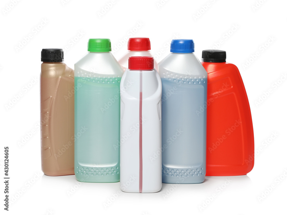 Antifreeze in plastic bottles isolated on white Antifreeze in plastic bottles isolated on white