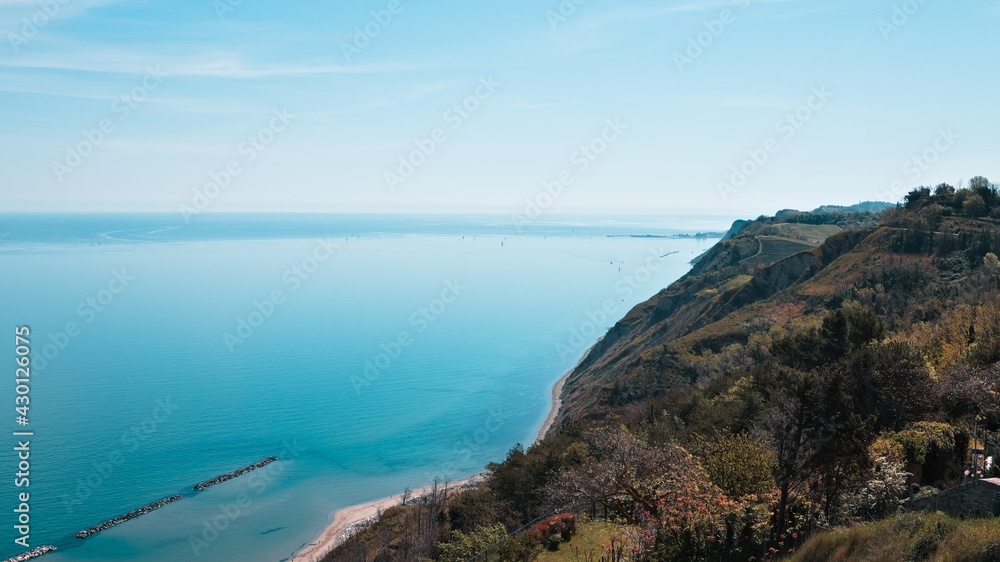 Panoramic view of 'Monte San Bartolo National Park' with vineyards above Adriatic sea (Pesaro, Marche, Italy, Europe) Panoramic view of 'Monte San Bartolo National Park' with vineyards above Adriatic sea (Pesaro, Marche, Italy, Europe)