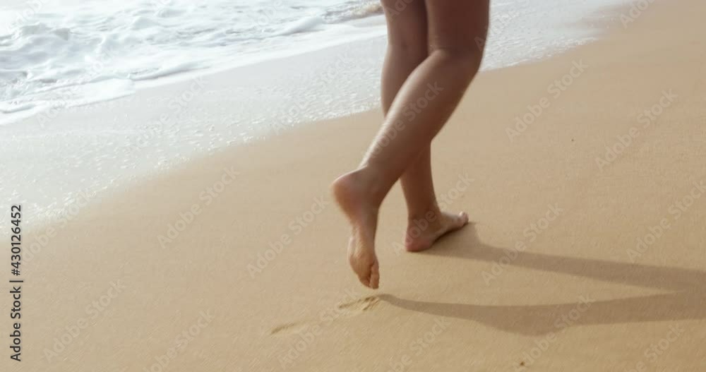 Legs on sandy beach. People walking on sand by the sea. Beach travel. Summer vacations concepts. 4k Cinematic. Legs on sandy beach. People walking on sand by the sea. Beach travel. Summer vacations concepts. 4k Cinematic.