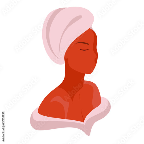Beautiful girl with a towel on her head in a bathrobe on a white background. Body and face care