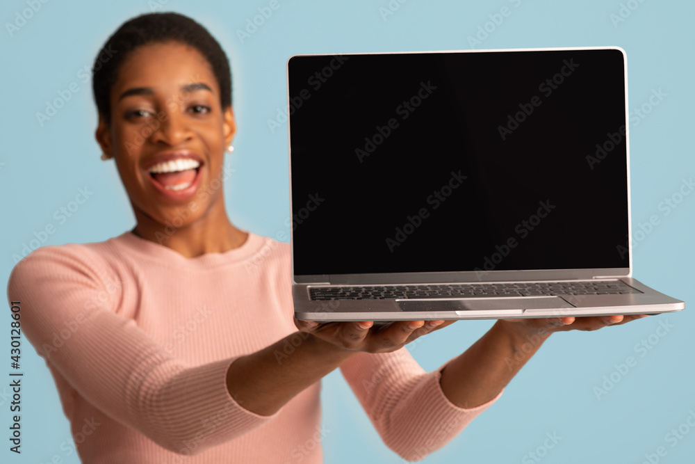 Joyful African American Lady Holding Laptop With Black Screen In Hands, Mockup Joyful African American Lady Holding Laptop With Black Screen In Hands, Mockup