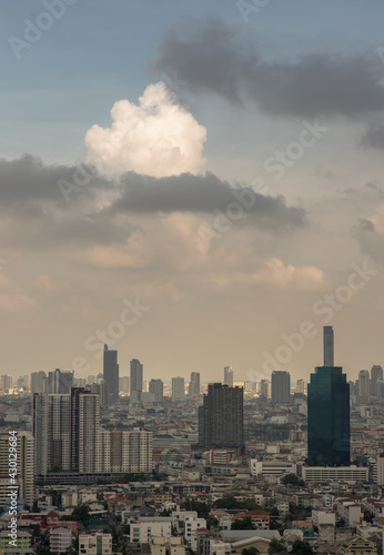 Bangkok, Thailand - Apr 16, 2021 : Beautiful sky and cloud view of Bangkok with skyscrapers in the business district in the afternoon. Selective focus.
