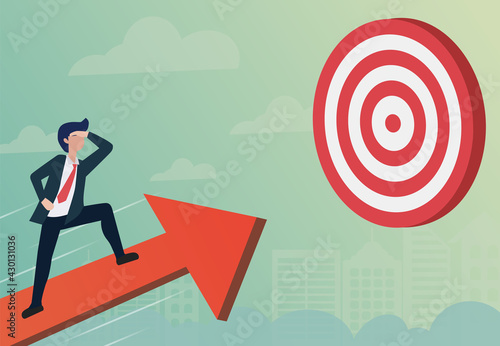 A business man standing on the arrow at the target. Head towards the goal with speed. For success in life. Business concept mission is complete.