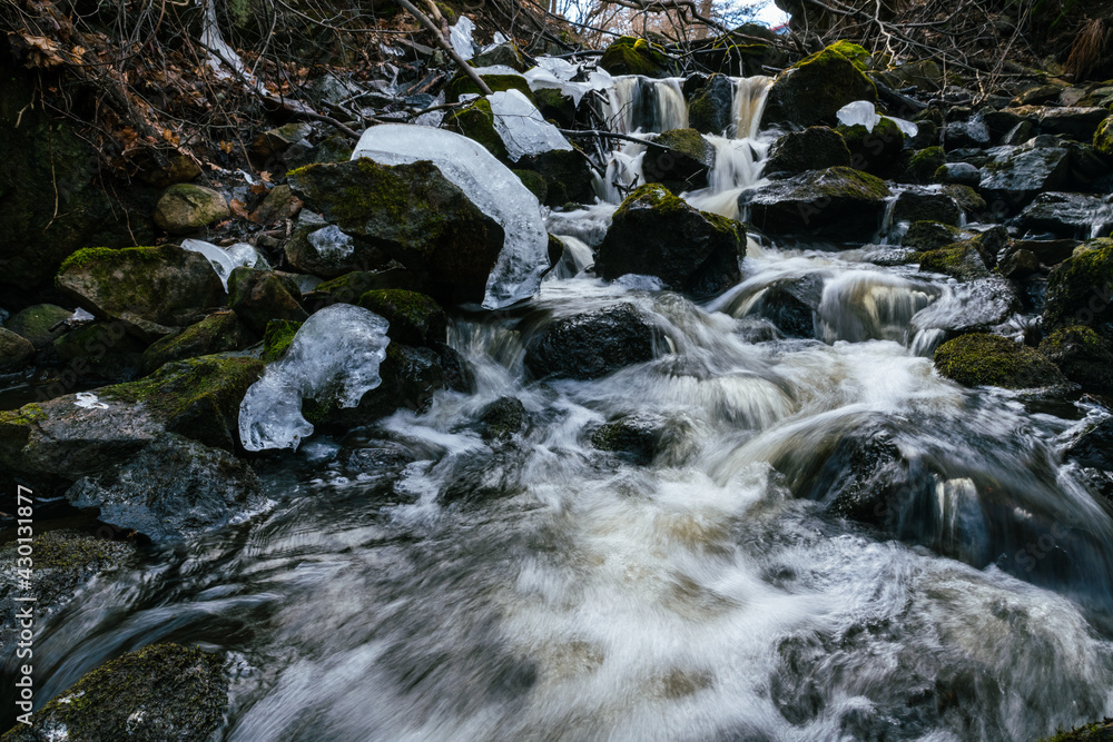 waterfall in the forest in spring waterfall in the forest in spring