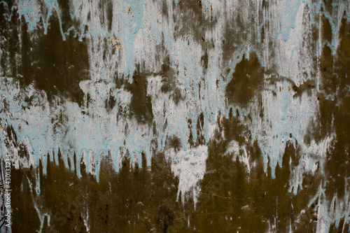 background metal surface with green paint and smudges