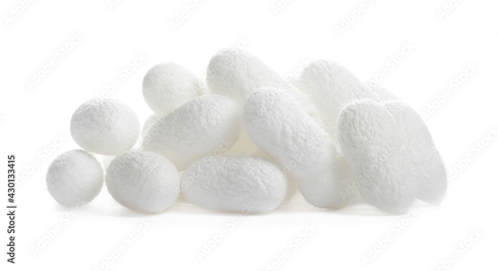 Pile of natural silkworm cocoons on white background Pile of natural silkworm cocoons on white background