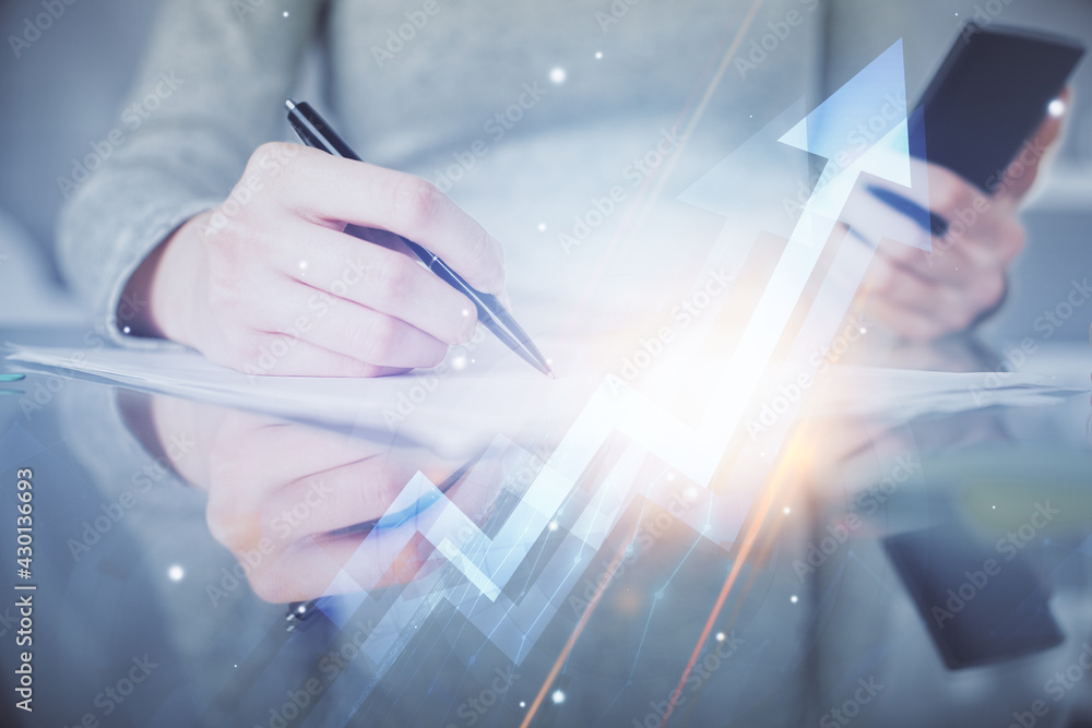 Double exposure of arrows hologram and woman holding and using a mobile device. Success concept. Double exposure of arrows hologram and woman holding and using a mobile device. Success concept.