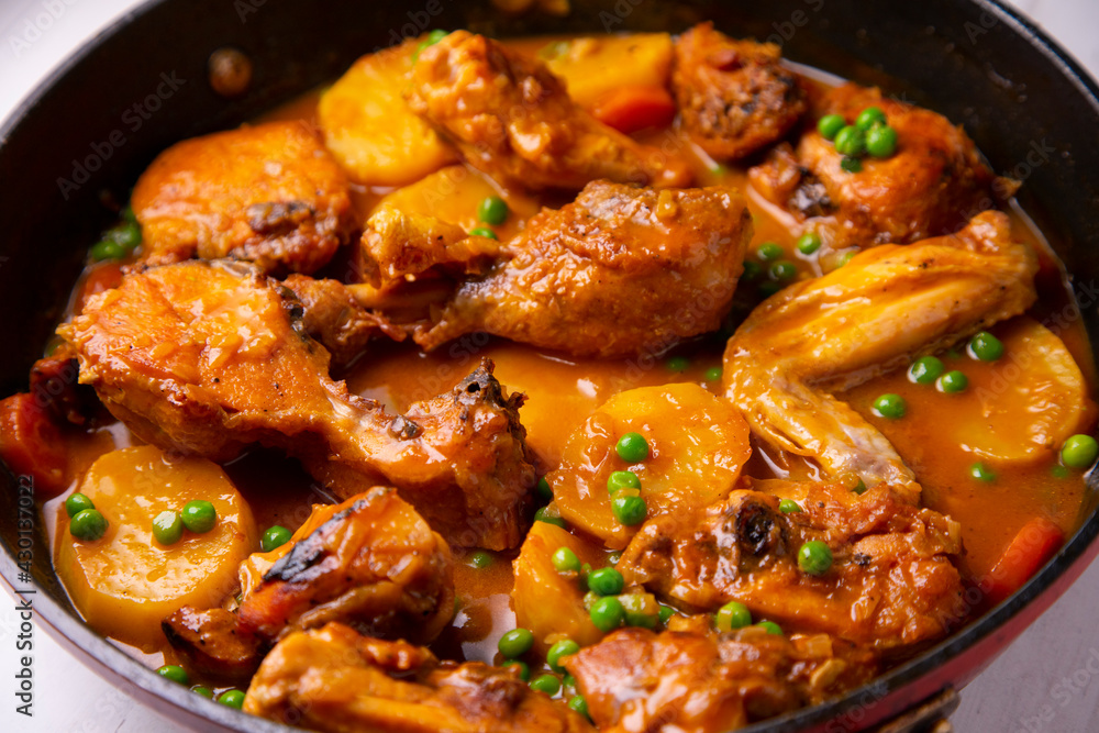 Chicken with potatoes and vegetables. Traditional tapa spanish recipe. Chicken with potatoes and vegetables. Traditional tapa spanish recipe.