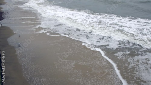 Blue waves of the baltic sea in cloudy weather