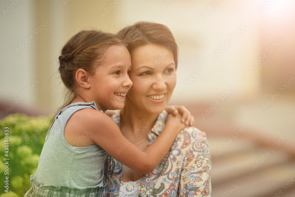 Portrait of happy mother and daughter outdoors Portrait of happy mother and daughter outdoors