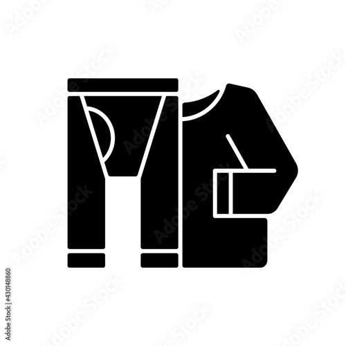 Thermal underwear black glyph icon. Sportswear and thermo clothing. Leggins and shirt for tourist. Roadtrip gear. Nomadic lifestyle. Silhouette symbol on white space. Vector isolated illustration