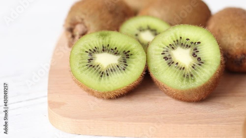 Juicy ripe kiwi on a wooden table