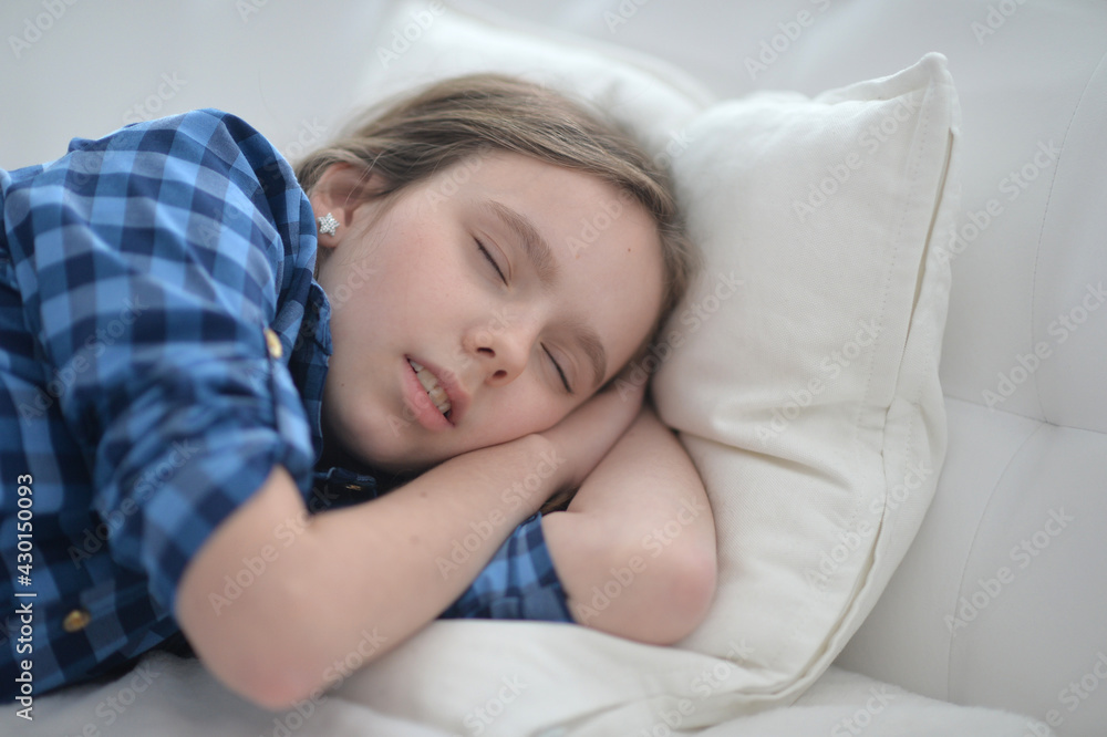 Cute little girl sleeping in bed at home Cute little girl sleeping in bed at home