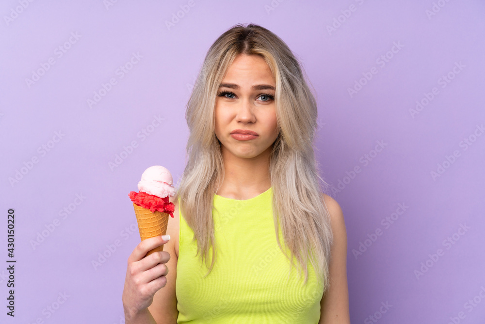 Teenager girl over isolated purple background with sad expression Teenager girl over isolated purple background with sad expression