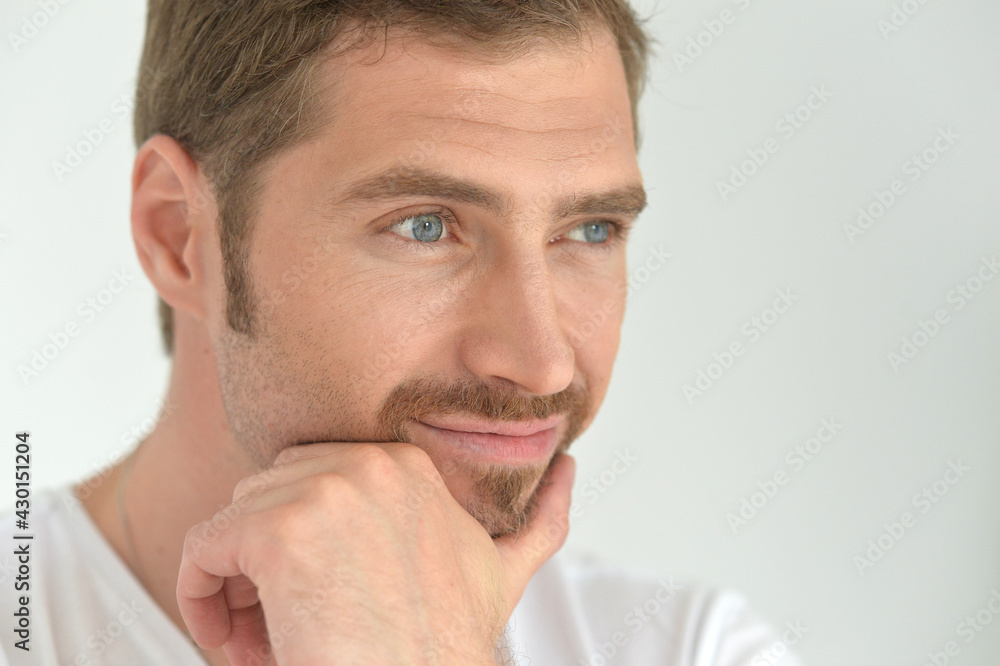 Portrait of handsome young man posing in studio Portrait of handsome young man posing in studio