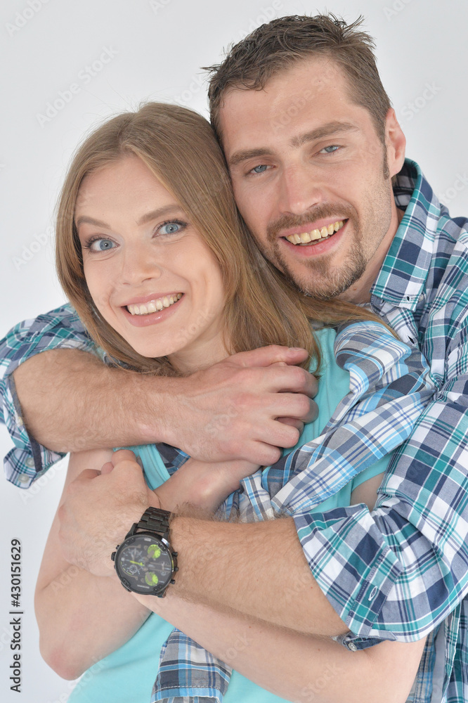 Portrait of happy young couple posing at home Portrait of happy young couple posing at home