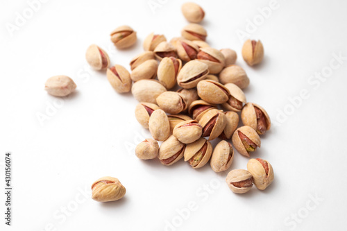 Pile of pistachios on a white background. Set of Pistachio nuts.