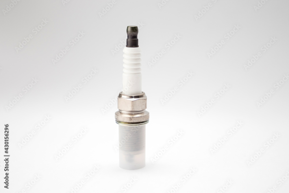 A new spark plugs on white background A new spark plugs on white background