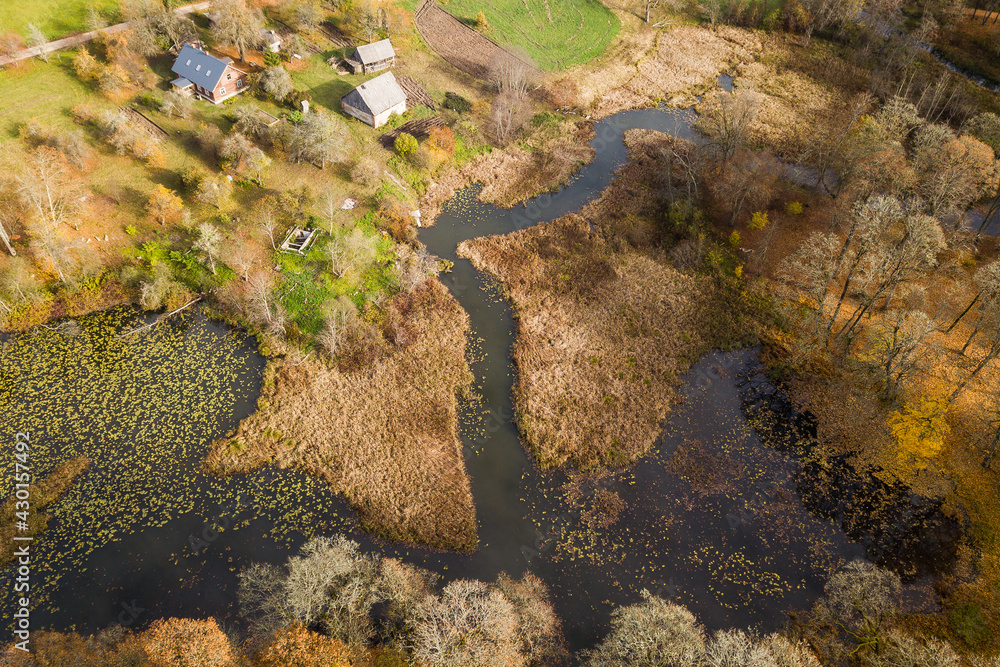 Aerial view of Edole village in sunny autumn day, Latvia. 