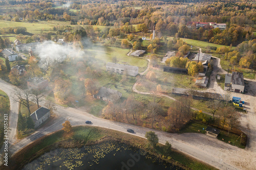 Aerial view of Edole village in sunny autumn day, Latvia.  photo