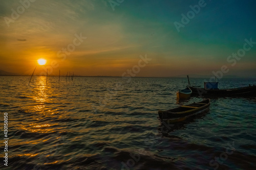 Sunset with boat © Anmol