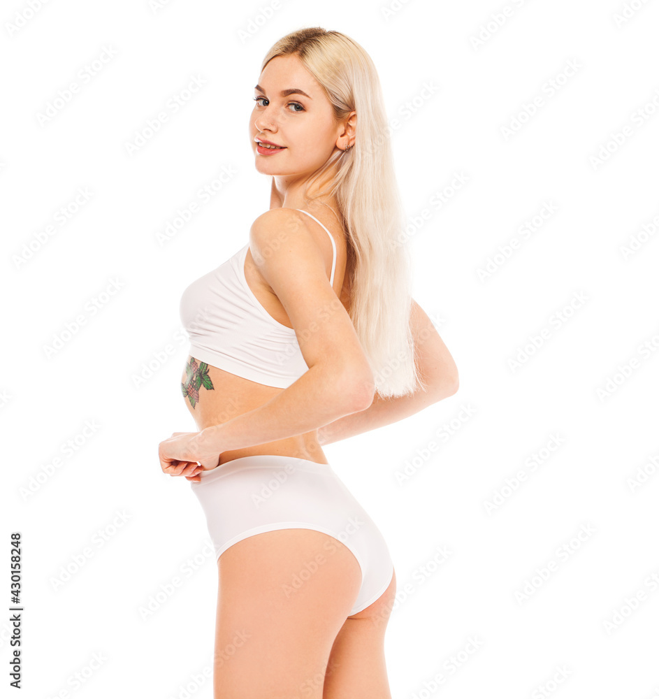 Young beautiful blonde woman in white sports underwear Young beautiful blonde woman in white sports underwear