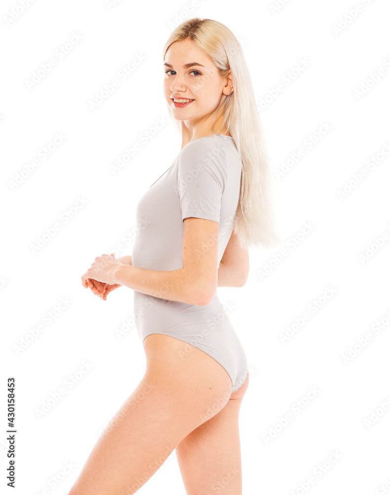 Portrait of a young blonde woman in gray bodysuit Portrait of a young blonde woman in gray bodysuit