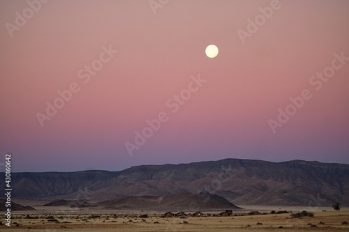 Rising Moon over Namib Desert in Namibia