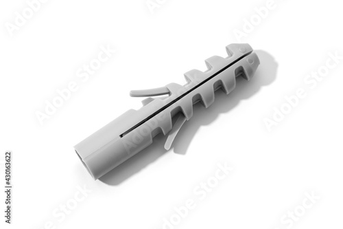 Plastic dowel isolated on a white background. Wall anchor photo