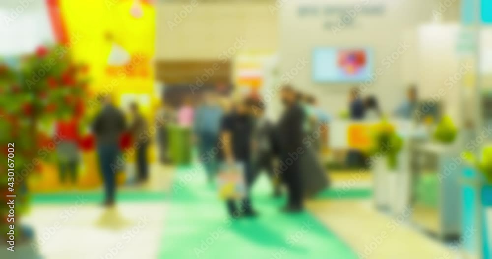 Modern city life. Abstract blurred background on business theme. Blurry defocused video. Unrecognizable people in a large modern building. Modern city life. Abstract blurred background on business theme. Blurry defocused video. Unrecognizable people in a large modern building.