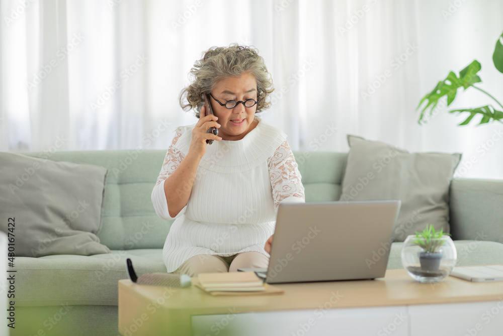 Elderly asian woman with white hairs talking with customer service on mobile phone to get resolve on computor problem or human error,Pensioner worry with wrong payment and struggling with technology Elderly asian woman with white hairs talking with customer service on mobile phone to get resolve on computor problem or human error,Pensioner worry with wrong payment and struggling with technology